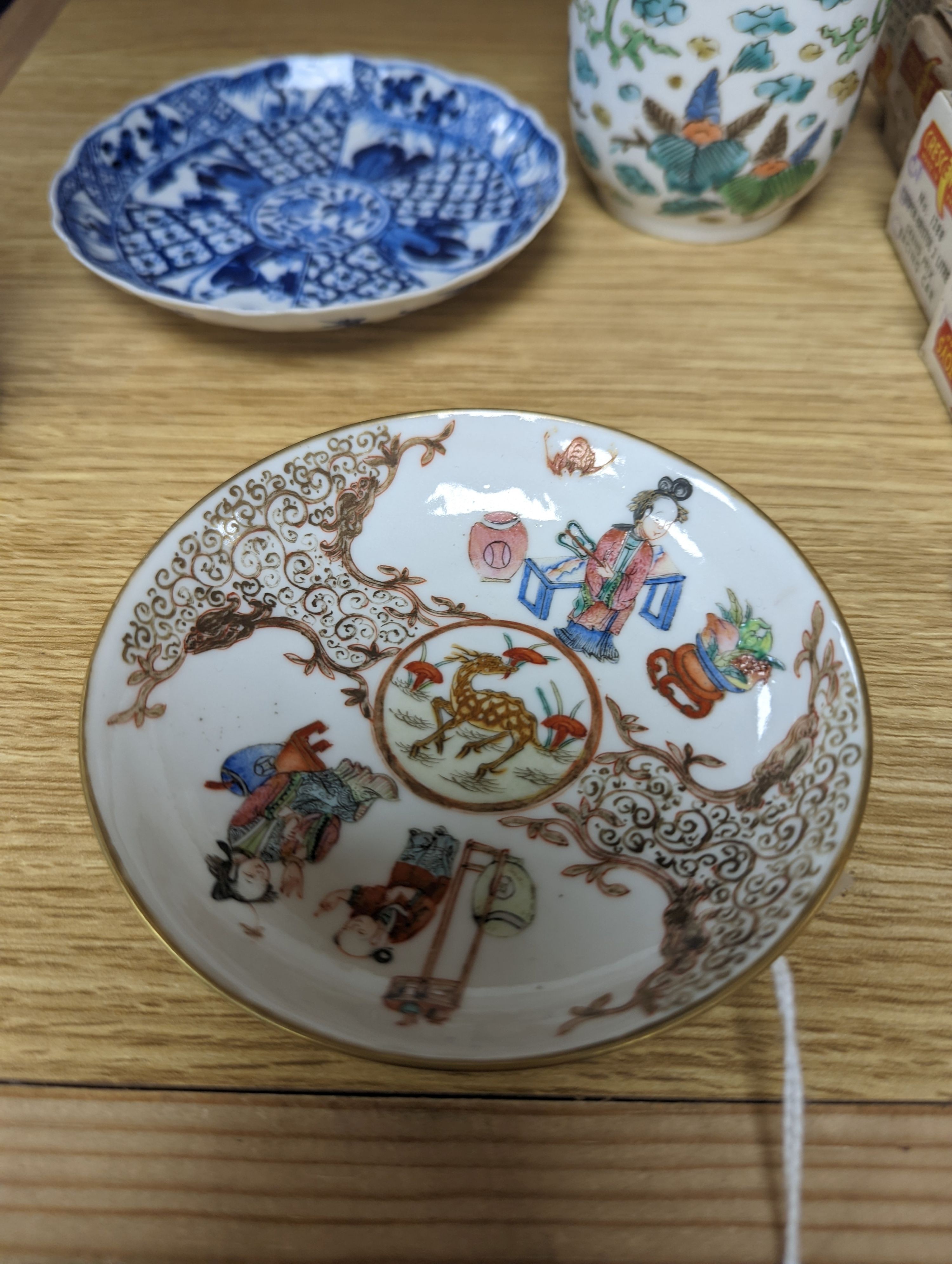 Two Chinese porcelain saucer dishes and an enamelled porcelain vase, 18th century and later, 12.5cm